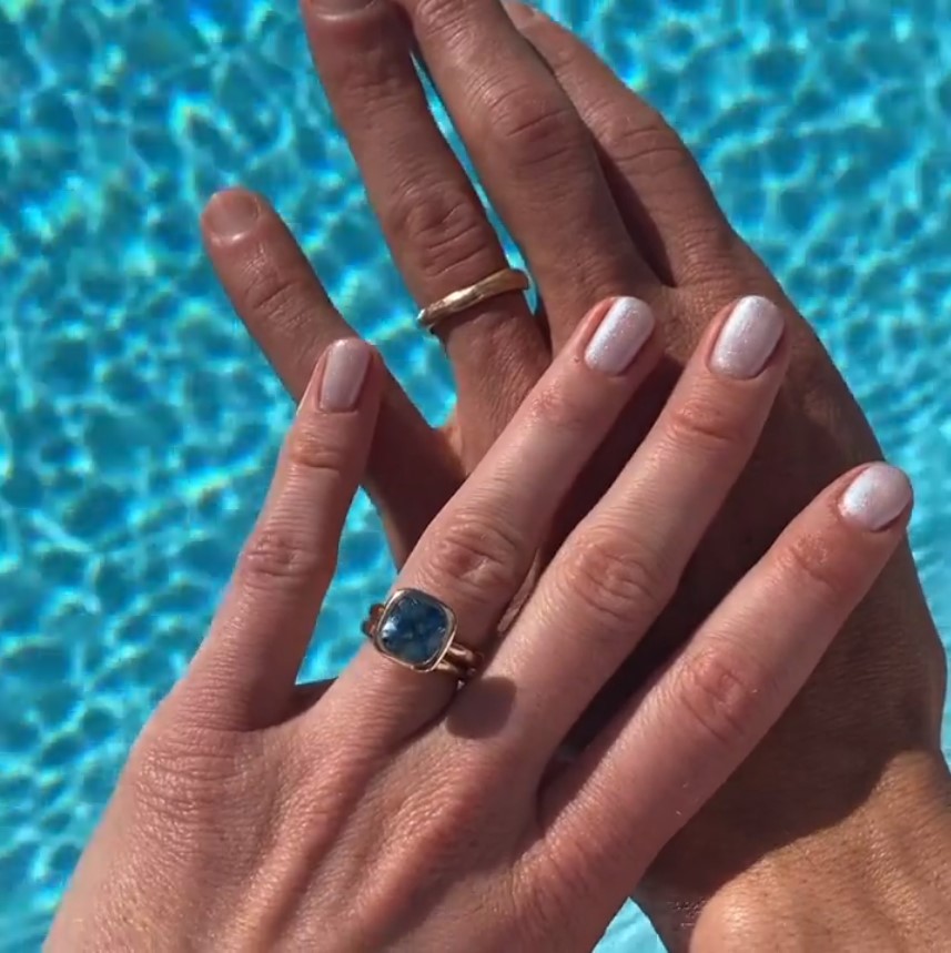 Bonnie Wright and her husband Andrew Lococo showing their wedding rings