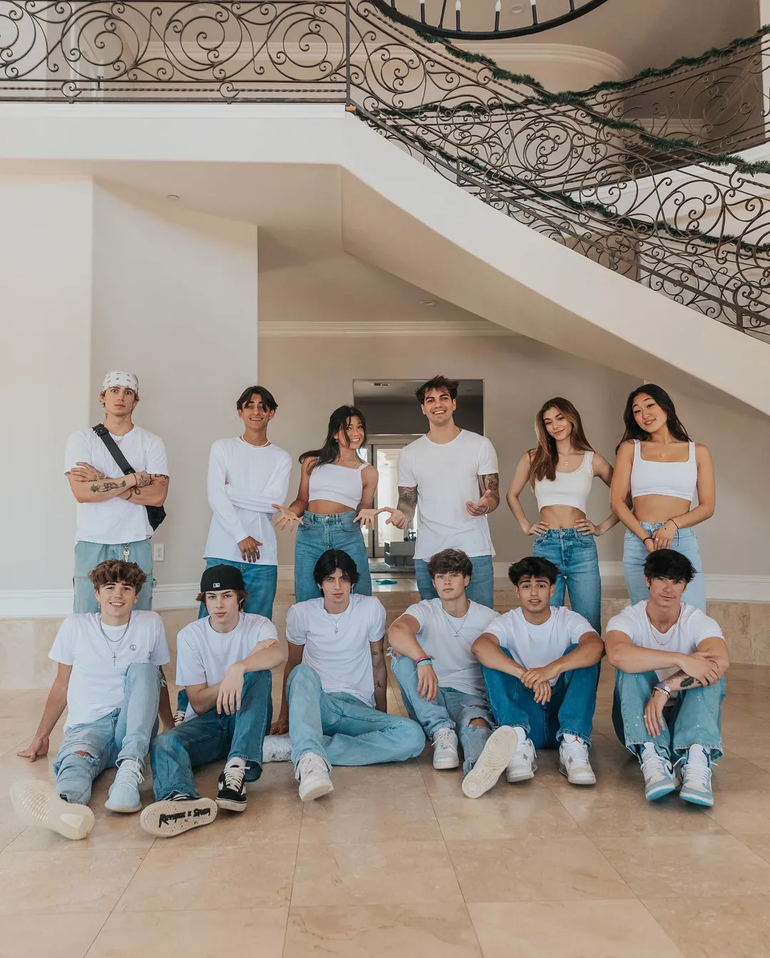 The old and new Hype House members pose together for a photoshoot