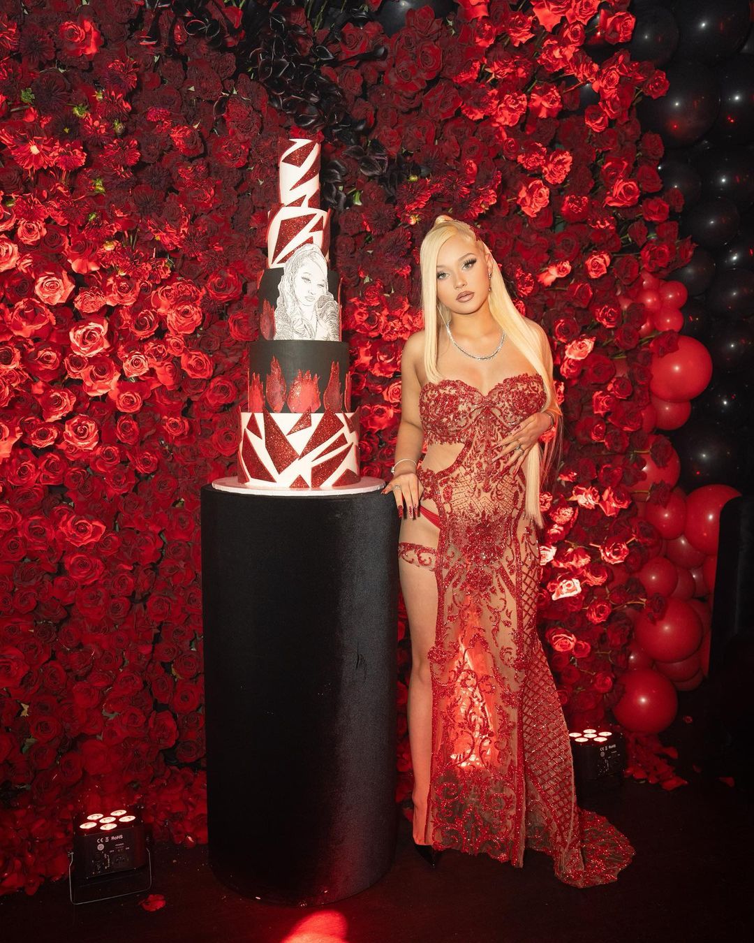 Alabama Luella Barker standing alongside her birthday cake at her 17th birthday party