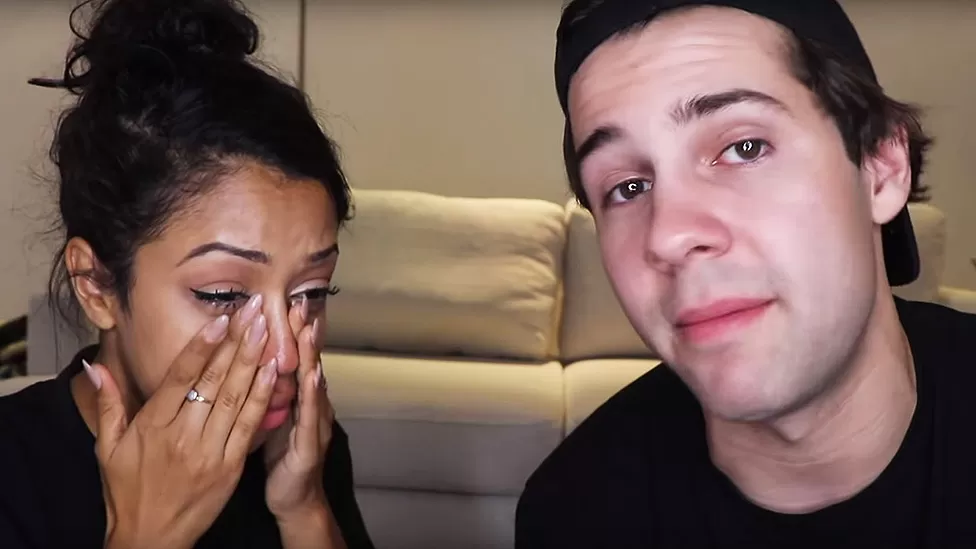Lisa Koshy and David Dovrik announced their breakup with teary eyes in a YouTube video