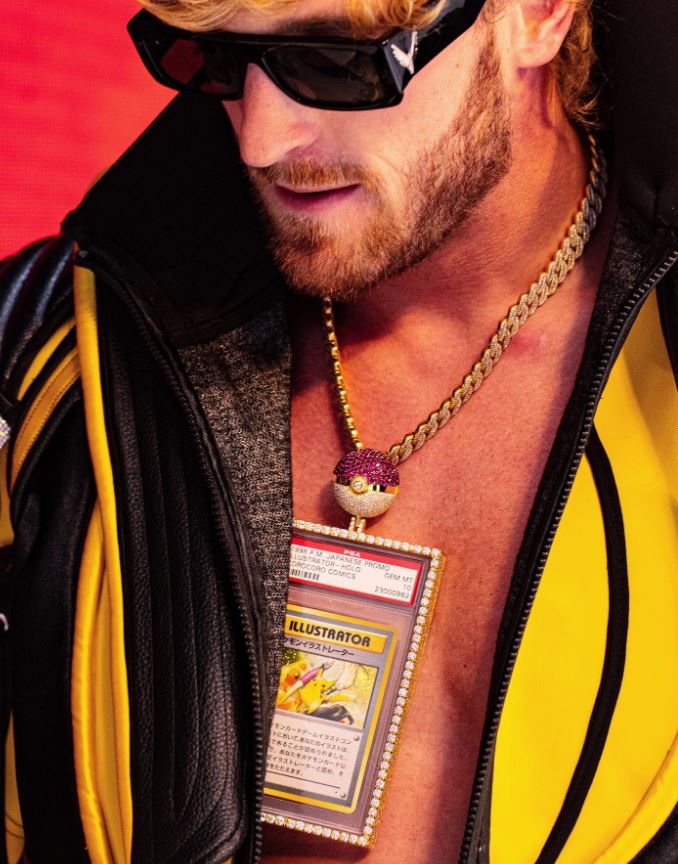 Logan Paul showing off his Pokemon card during his WWE wrestling debut at WrestleMania 38.