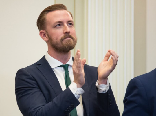 Ryan Walters applauds during the 2023 State of the State address