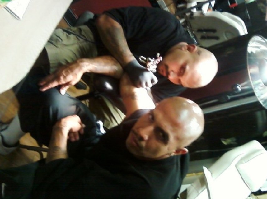 Arnold Contreras is a tattoo artist.