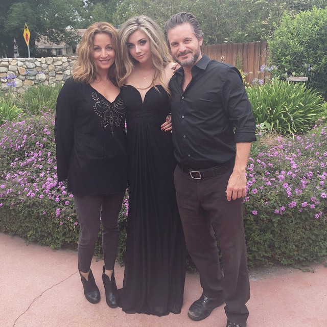 Giorgia Whigham with her parents, Christine Whigham and Shea Whigham.