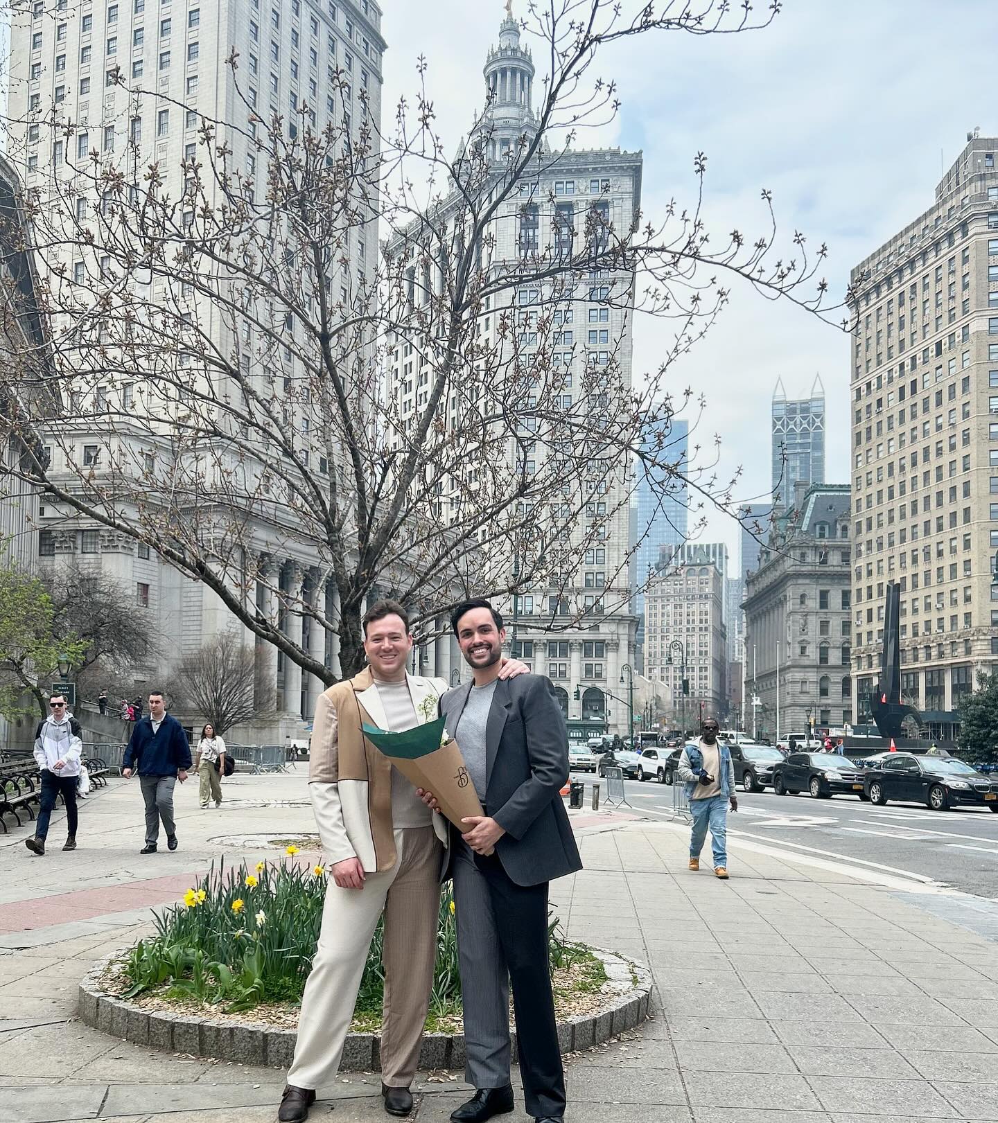 Kyle Viljoen and husband Dr. Zachary Riley posing together after secret wedding