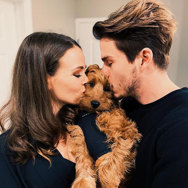​Jocelyn Hudon and her now-husband Jake Manley with their pet