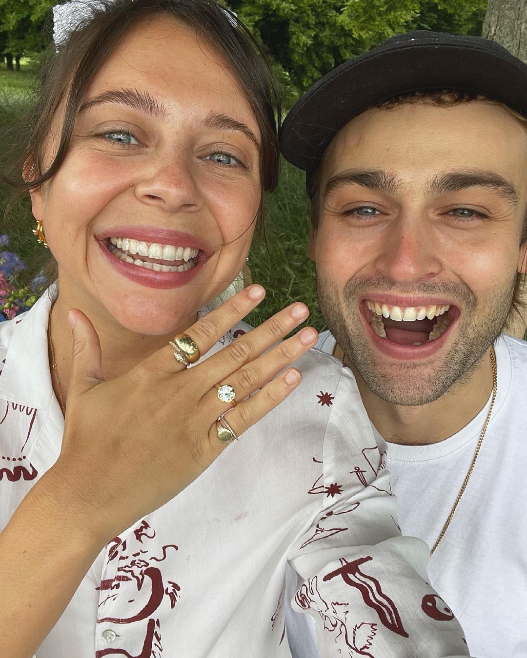 Bel Powley showing her engagement ring in a selfie with her fiance Douglas Booth.