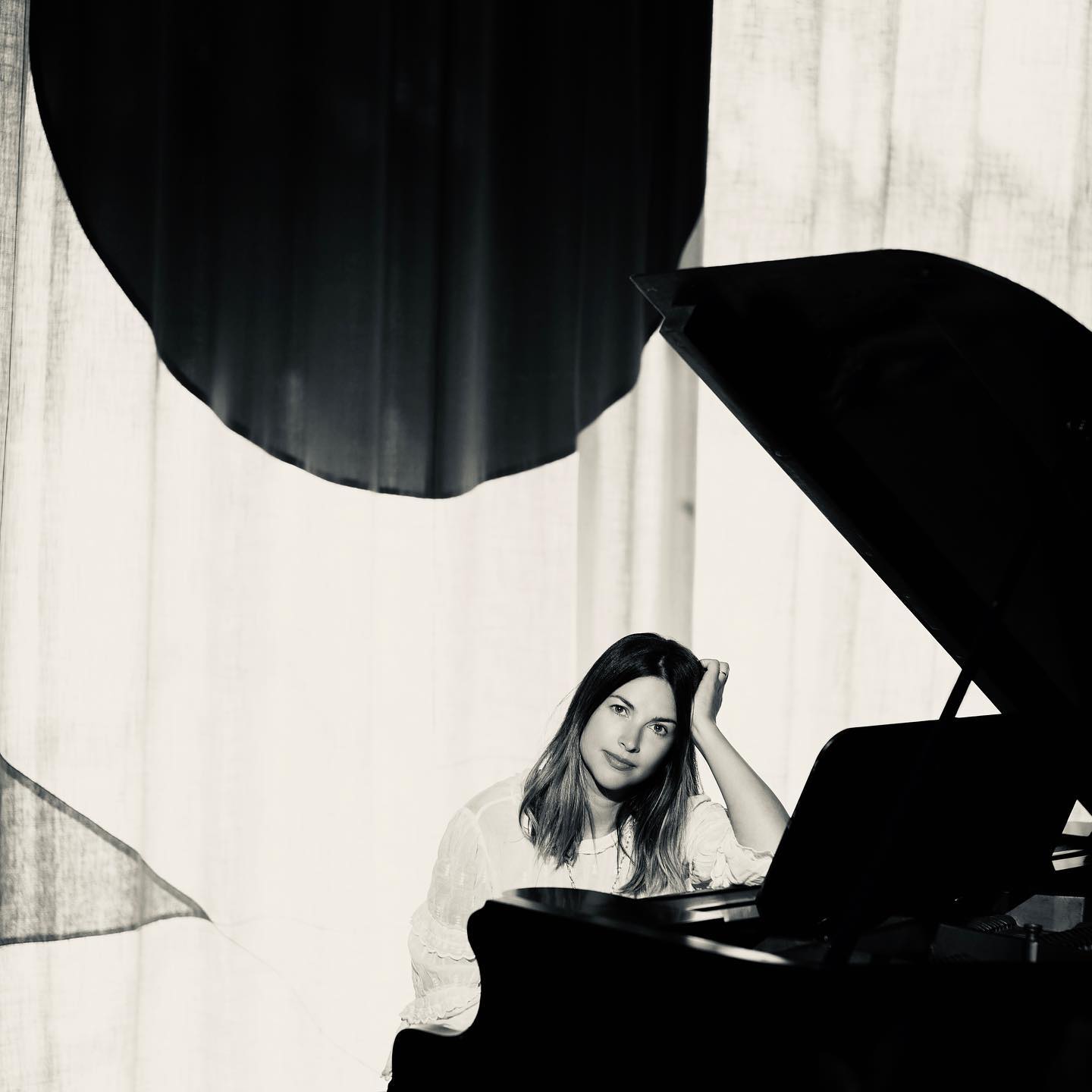 Jaime Dornan's wife Amelia Warner playing piano.