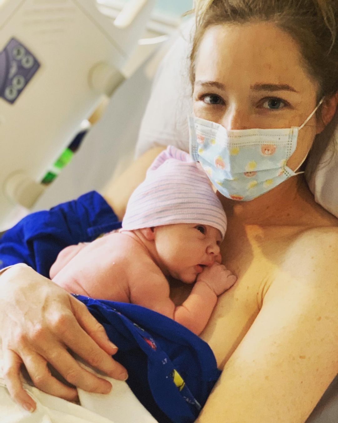 Kristen Connolly holding her baby girl.