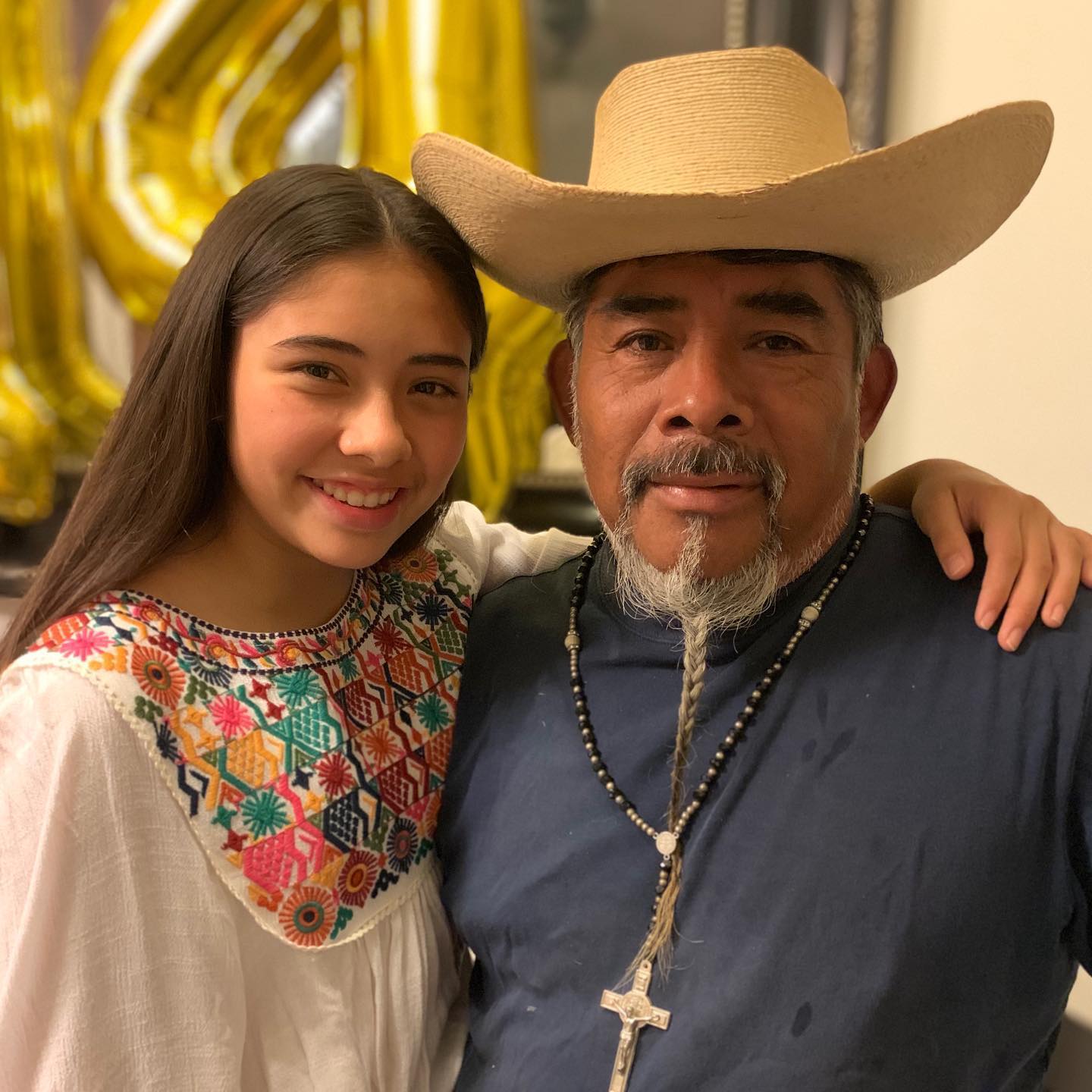 Xochitl Gomez with her father.
