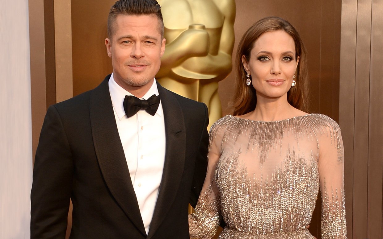 Angelina Jolie with Brad Pitt at an award ceremony