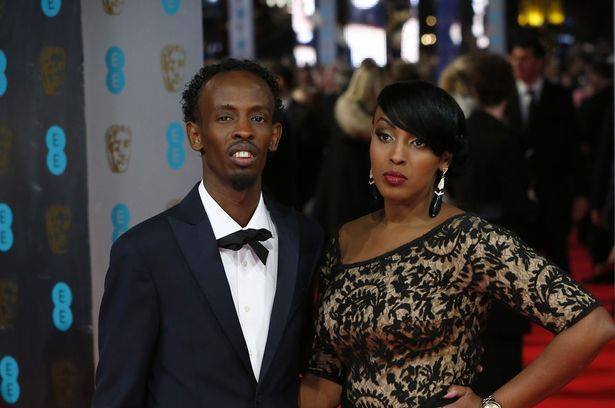 Barkhad Abdi with the mysterious lady who is regarded as his wife