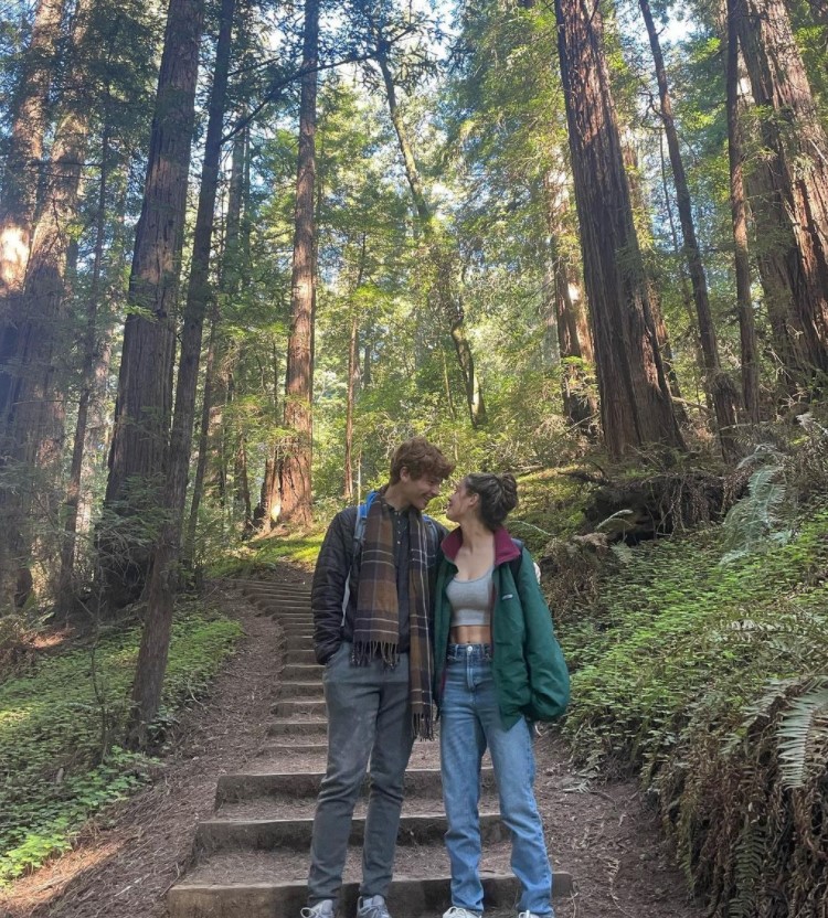 Carson Holmes and his girlfriend Sydney McCann in the woods