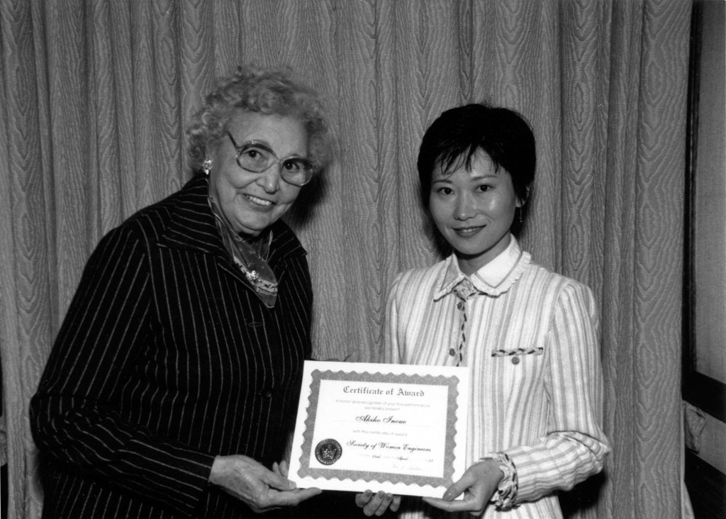 Mary G. Ross giving an SWE certificate to Akiko Inoue