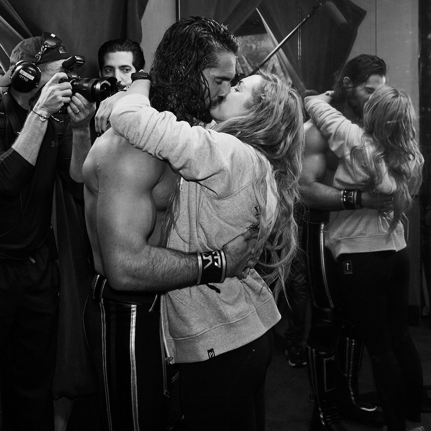 Seth Rollins kissing his wife Becky Lynch