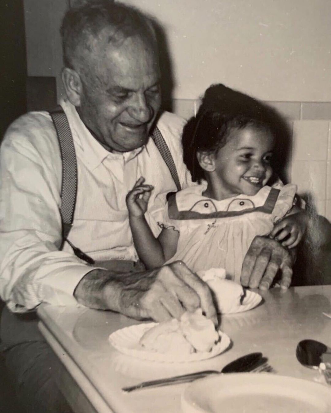 Gloria Reuben with her father, Cyril George Reuben, when she was two