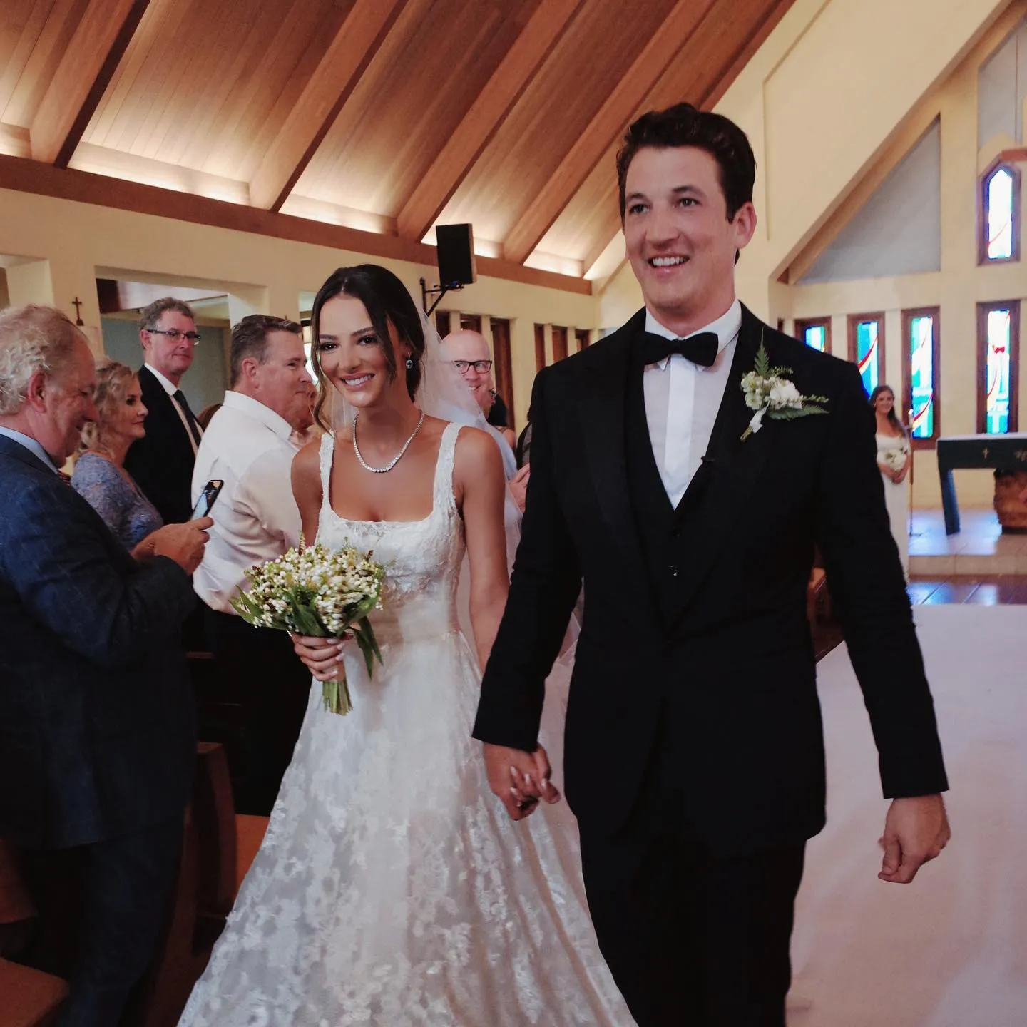 Keleigh Sperry and her husband, Miles Teller, at their wedding