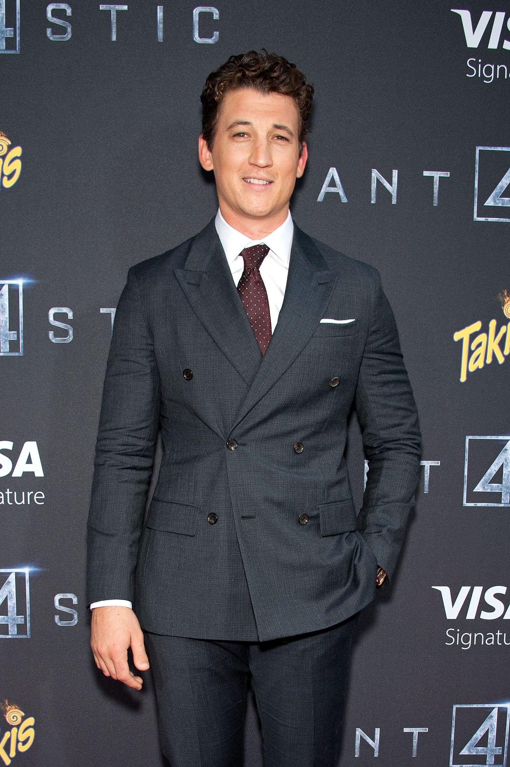 Miles Teller standing tall at the premiere of his 2015 movie 'Fantastic Four'