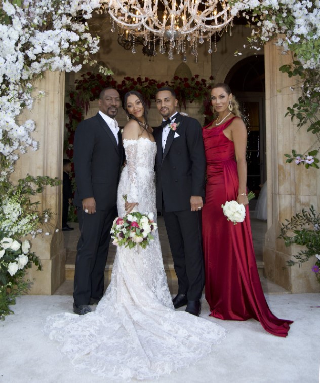 Bria Murphy with her husband, Michael Xavier, and her parents at her wedding