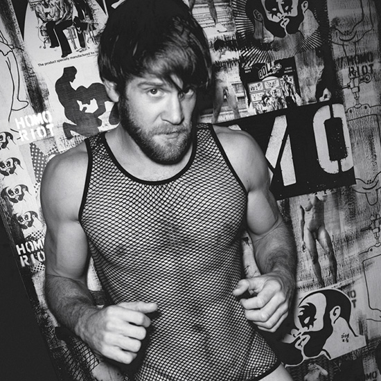Colby Keller posing for a photoshoot