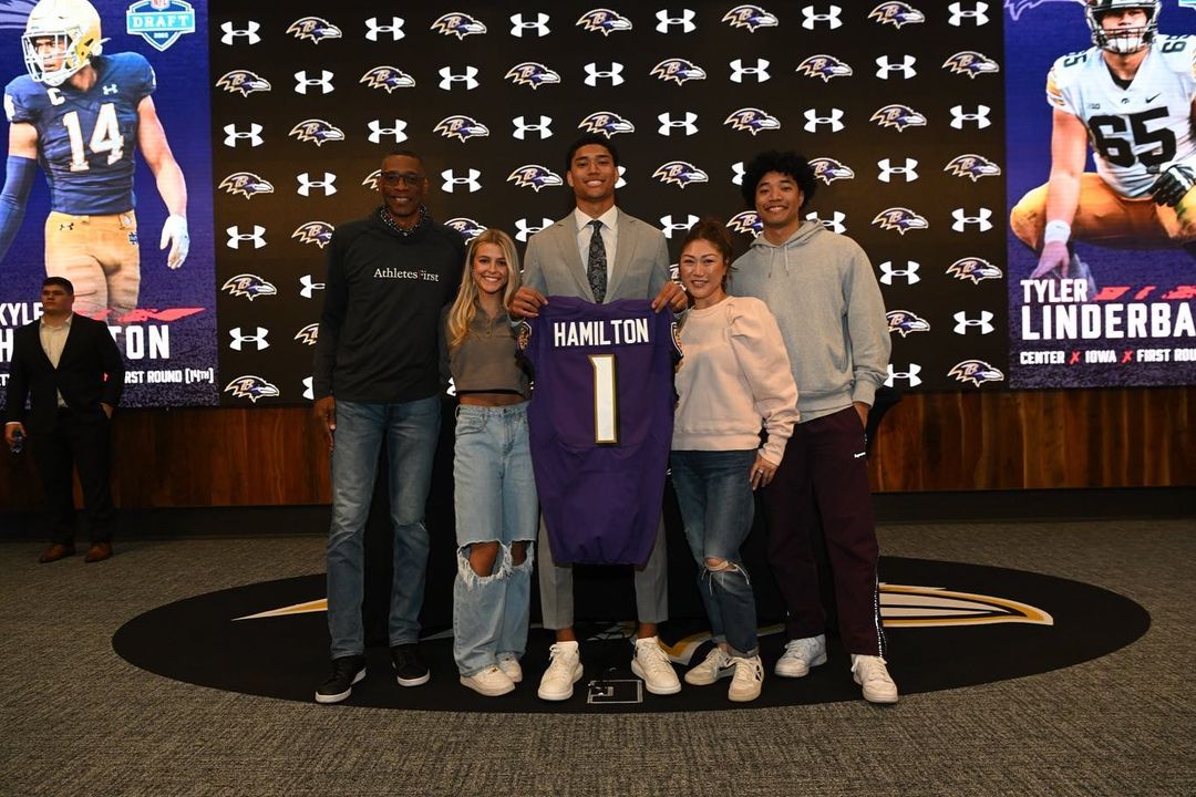 Kyle Hamilton with his parents - mom Jackie and dad Derrick, girlfriend Reese, and brother Tyler