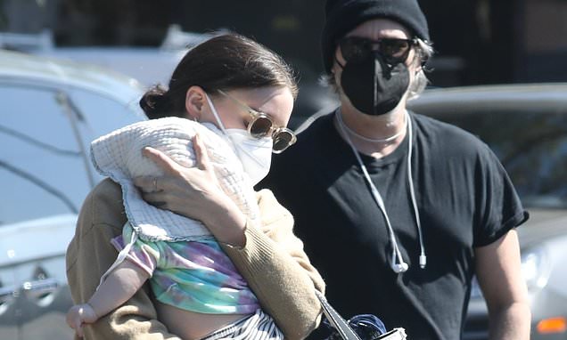 Joaquin Phoenix and fiancée Rooney Mara were seen with their newborn son River in LA. 