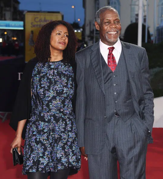 Asake Bomani with his ex-wife Danny Glover. 
