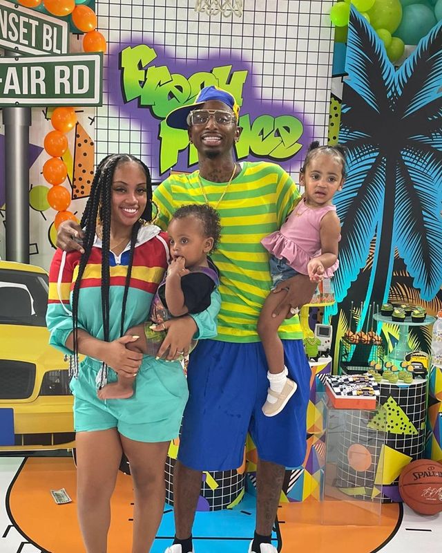FunnyMike posing for a picture with his baby mama and girlfriend, Jaliyah, and their kids. 