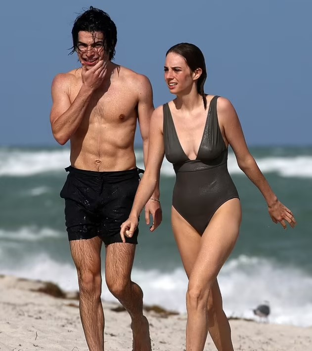 Maya Hawke and her boyfriend, Spencer Barnett, returning after a swim
