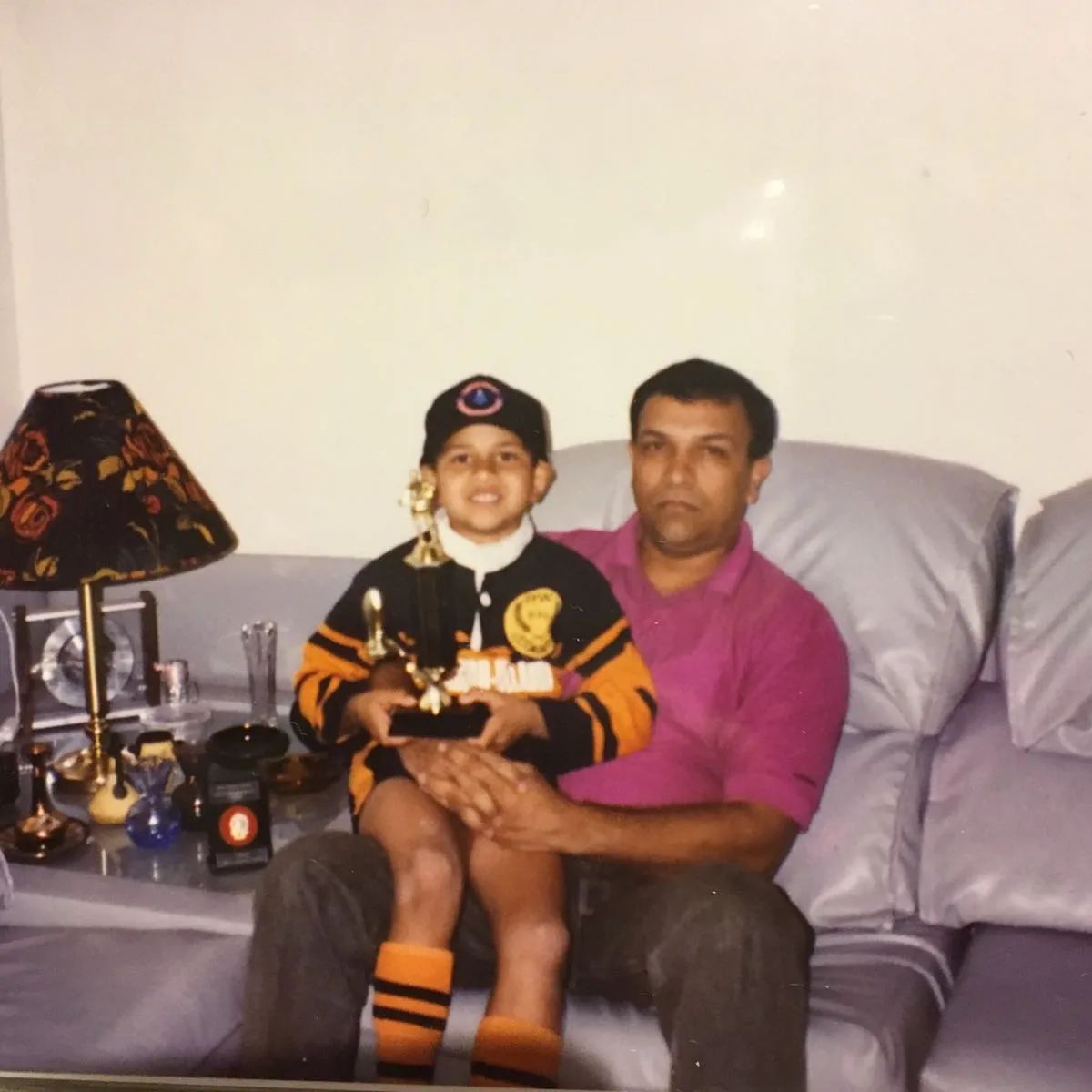 A throwback picture of Usman Khawaja sitting together with his father