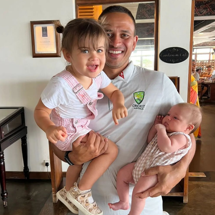 Usman Khawaja with his two daughters. 