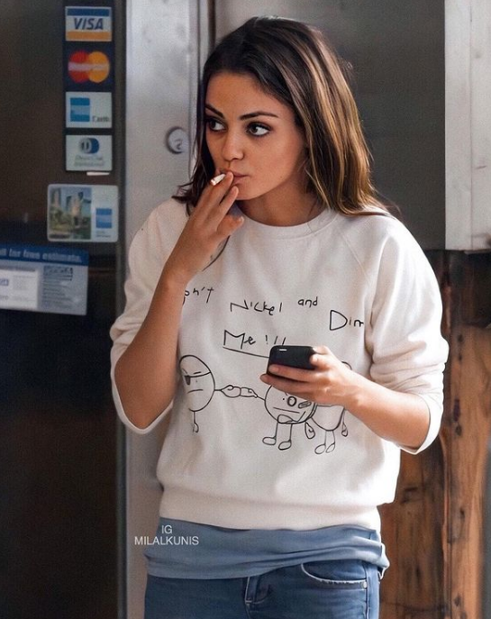 Mila Kunis smoking cigarette. (Source: Instagram)