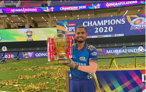 Anukul Roy with the IPL trophy as a part of the Mumbai Indians squad in 2020