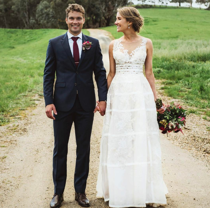 Alex Carey with his wife, Eloise Carey on their wedding day. 