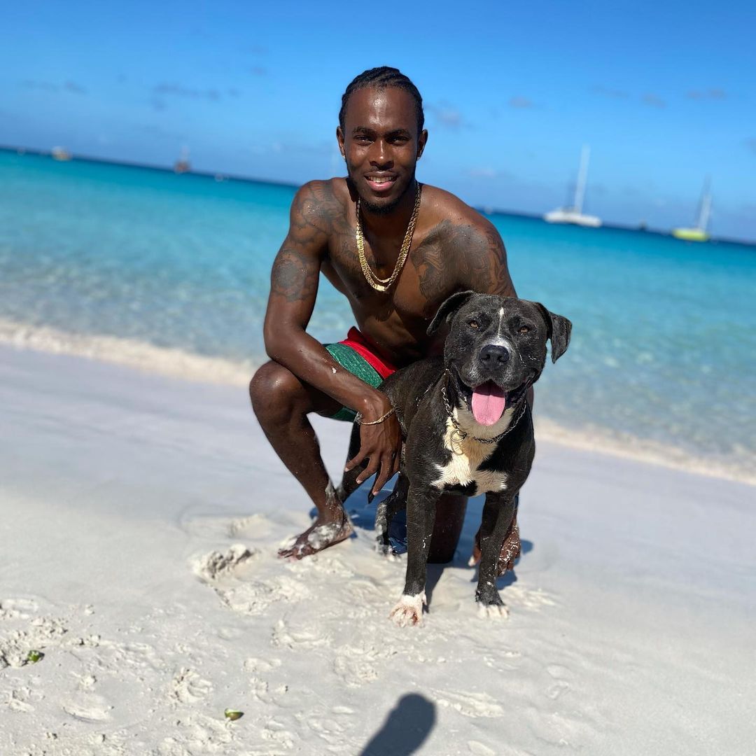 Jofra Archer while walking his dog on the beach in the mornings