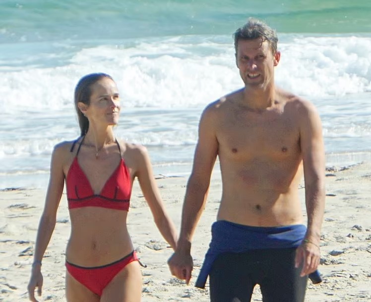 Isabel Lucas had a great time on the beach with her beau. 