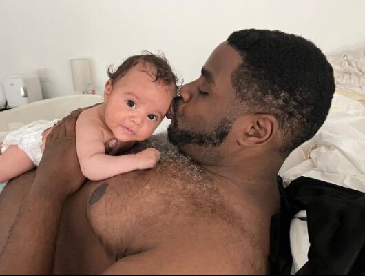Ron Funches with his new born son 