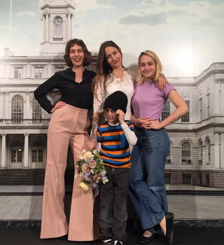 Kirke sisters with a child