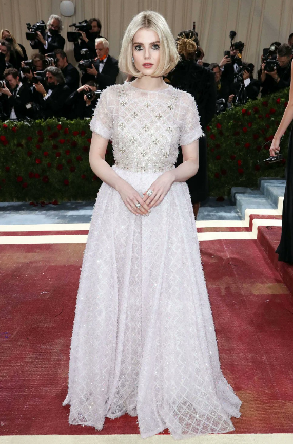 Lucy Boynton flaunting Channel at Met Gala 2022. 