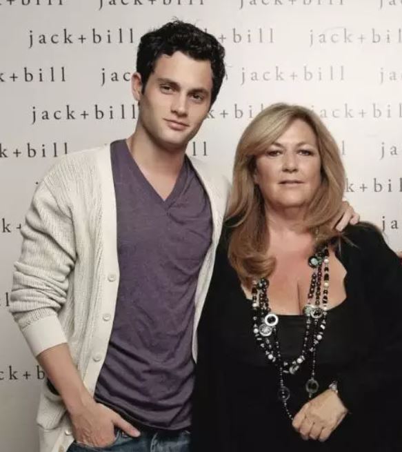 A snippet of Penn Badgley with his mother at an event