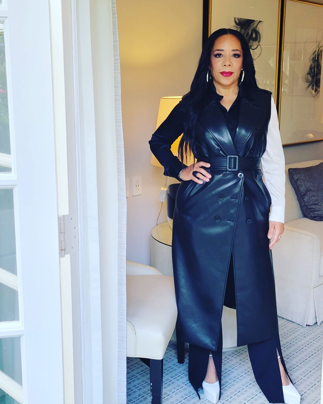 Selenis Leyva as seen in a black dress on the press day of 'Creed III'