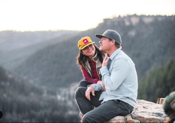 Ben Dozier and Cristi Dozier sitting near a cliff (Soruce: Instagram) 
