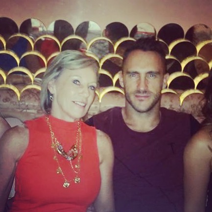 Faf du Plessis posing for pictures with his mother, Ina Rynners. 