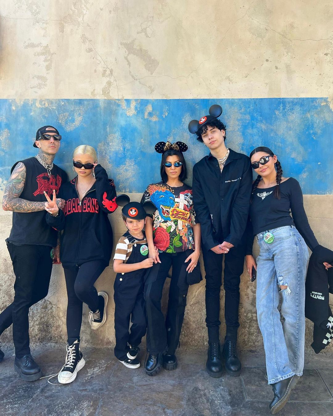 Kourtney Kardashian and Travis Barker with their children.