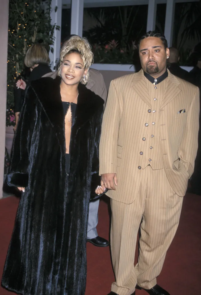 T-Boz and Mack 10 holding hands together 