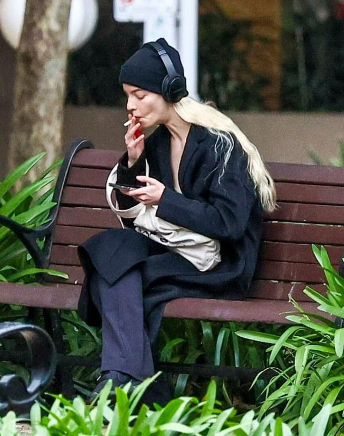 Anya Taylor-Joy caught smoking during a stroll in Sydney's Hyde Park.