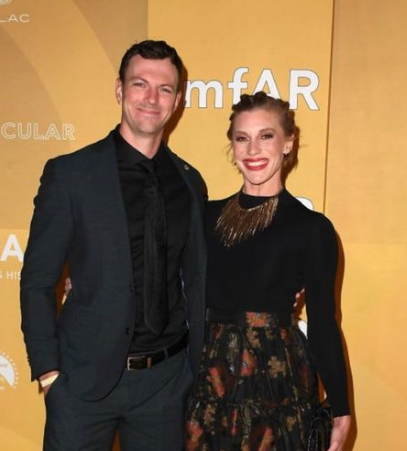Katee Sackhoff and Robin Gadsby in the event of amfAR