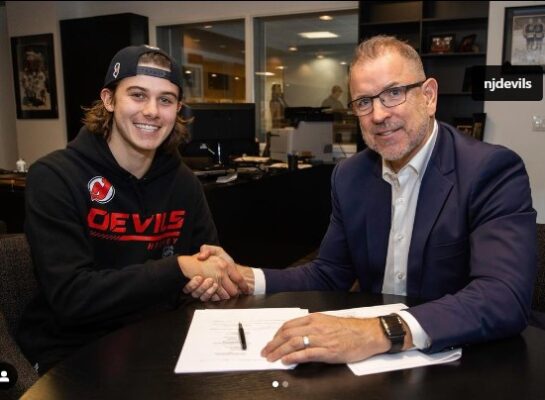 Jack Hughes signing deal with the New Jersey Devils (Source: Instagram) 