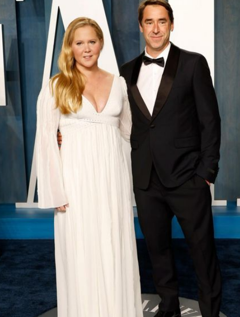 Amy Schumer with her husband Chris Fischer.