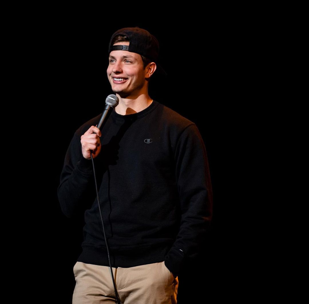 Matt Rife on the stage during one of his stand up shows